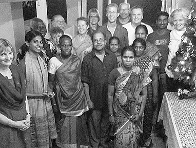 Theosophical Society - Tim with members and staff after setting up the Christmas tree at the Leadbeater Chambers dining hall in Adyar.