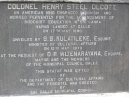 Theosophical Society - Henry S. Olcott Plaque under statue near bus station. (1708, 1709) (Close-up)Colonel Henry Steel Olcott was an American military officer, journalist, lawyer and the co-founder and first President of the Theosophical Society. Olcott was the first well-known American of European ancestry to make a formal conversion to Buddhism.