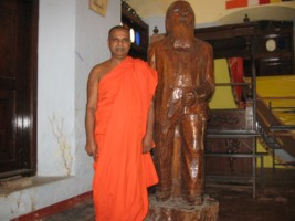 Theosophical Society - Principal of Dhamma School with Statue of Colonel Henry Steel Olcott. Colonel Olcott was an American military officer, journalist, lawyer and the co-founder and first President of the Theosophical Society. Olcott was the first well-known American of European ancestry to make a formal conversion to Buddhism.