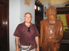 Theosophical Society - Photographer, Ben Furman with statue of Colonel Henry Steel Olcott. Colonel Alcott was an American military officer, journalist, lawyer and the co-founder and first President of the Theosophical Society. Olcott was the first well-known American of European ancestry to make a formal conversion to Buddhism.